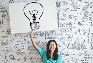 woman-holding-lightbulb-poster