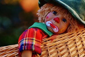 sad-doll-in-basket