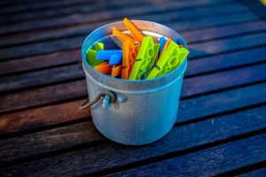 bucket-with-clothespins