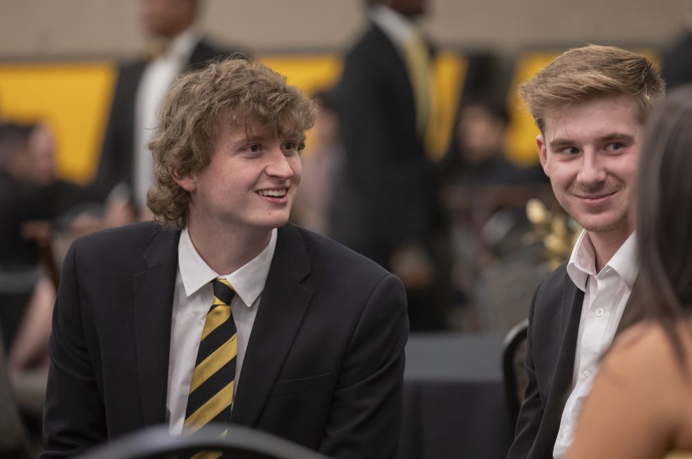 Smiling-MU-student-in-suit-and-tie