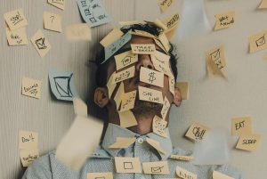 man-with-post-it-notes-over-face