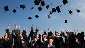 Mortar boards thrown in air