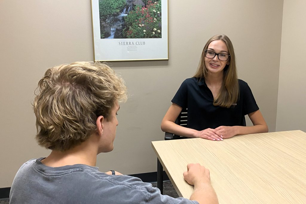 career counsleor speaking with MU student