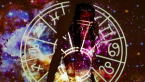 Zodiac image projected on woman