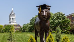 Tiger statue with graduation cap