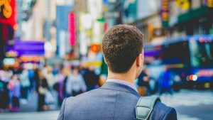 back-of-intern-head-at-busy-intersection