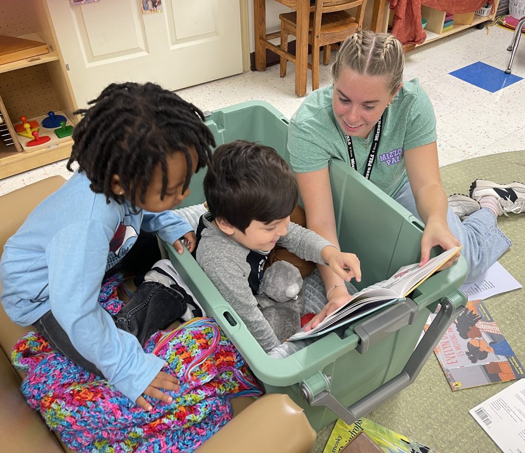 Mizzou PALS tutor Breanna with children