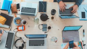 aerial view of laptops on table
